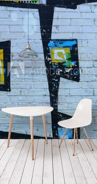 Image de Fragment of graffiti drawings The old wall decorated with paint stains in the style of street art culture Colored background texture